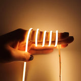 LUMIFLEX Aura CRI90 COB Strip – Whisper-Thin Architectural Lighting for Toe-Kick Recesses and Aluminum Profiles