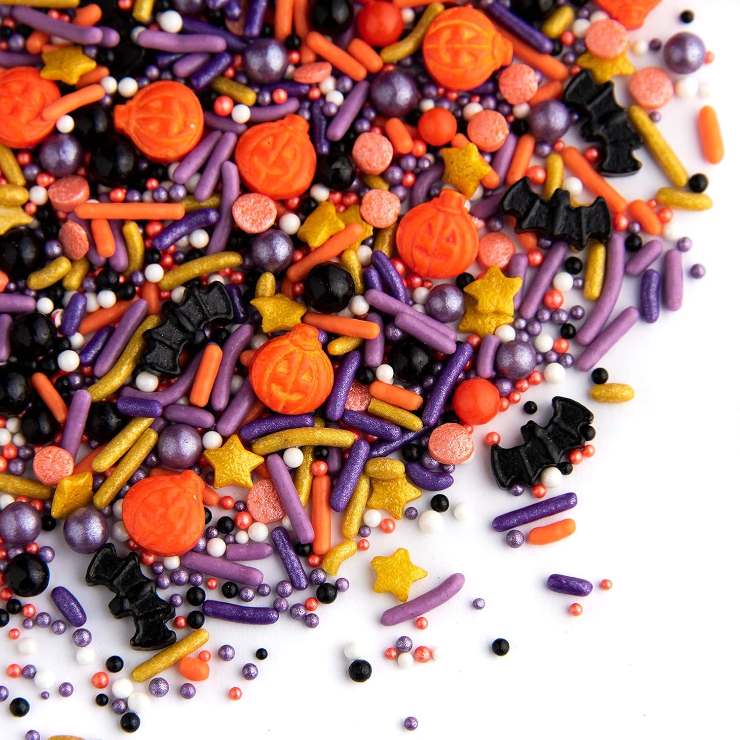 mixed textures combining crunchy nonpareils, shiny sugar pearls, and flat confetti quins
