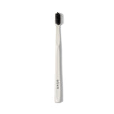 Boka Classic Manual Toothbrush with Extra Soft Activated-Charcoal, Tapered Bristles, Bioplastic Handle that Includes Travel Cap, Dentist-Approved, Housewarming Gift for Sustainable Home, White (Pack of 4)